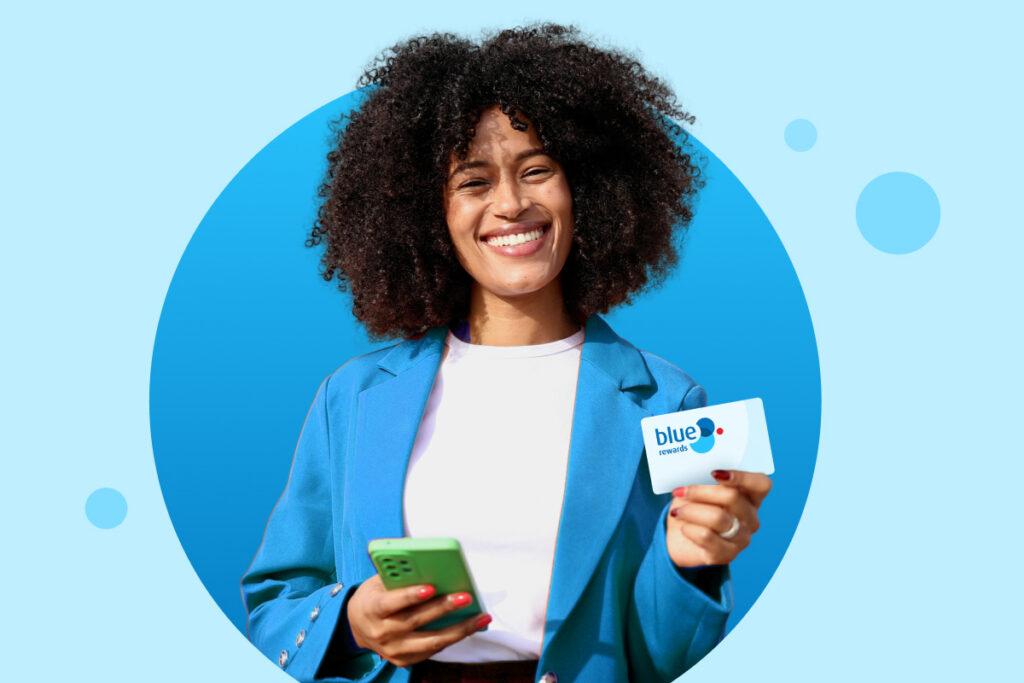 Girl smiling with her Blue Rewards Card