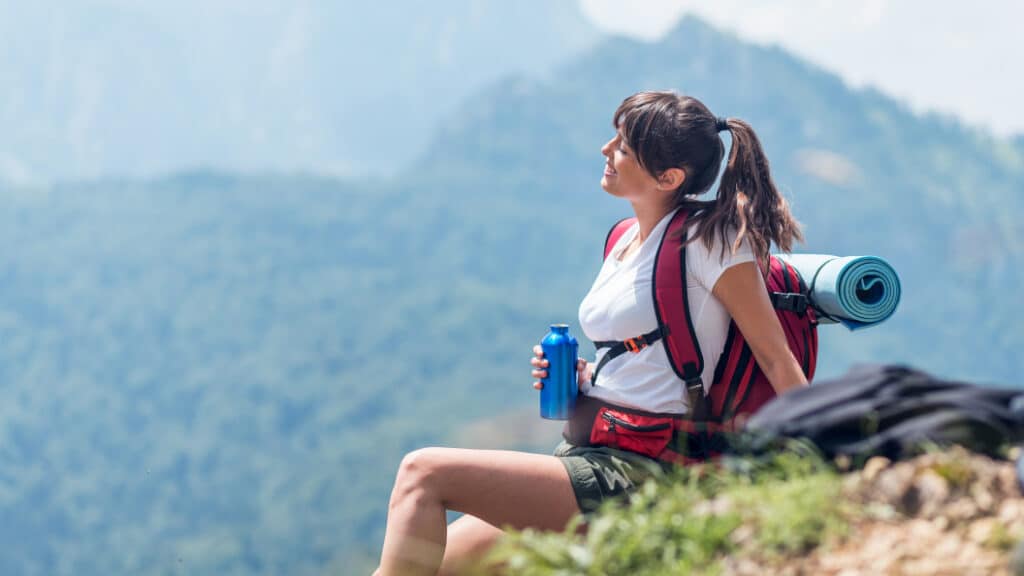 girl enjoying nature while practicing sustainability